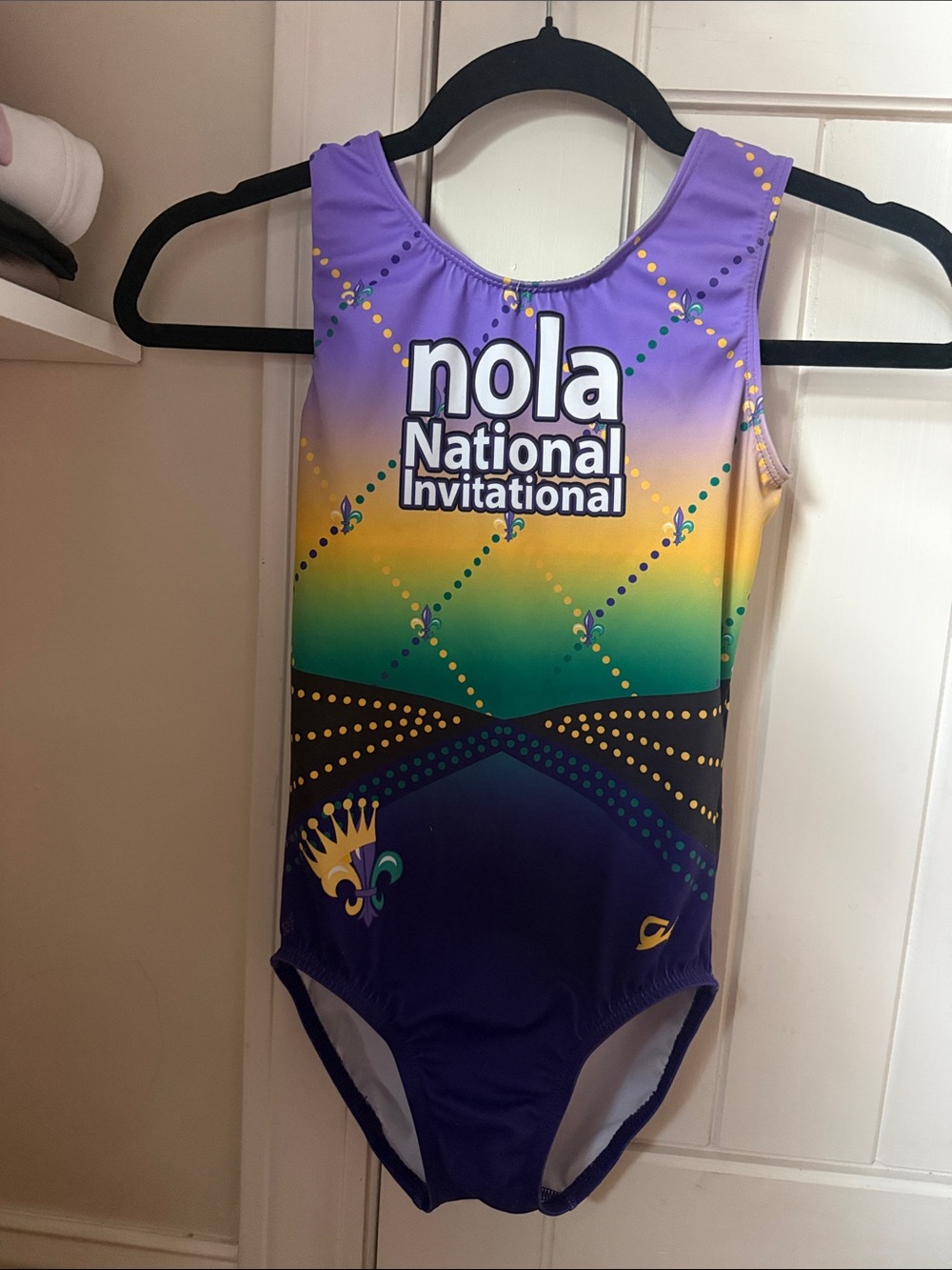 GKNola National Invitational Purple Green Yellow Gymnastics leotard Mardi Gras.